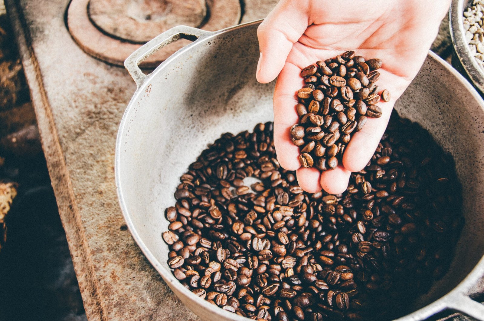 coffee beans in a men hands