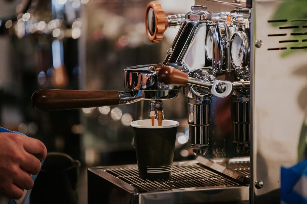 espresso machine pouring coffee in a cup