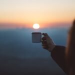 girl drinking coffee from seattle specialty coffee rooster