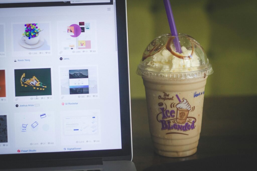 coffee ice cream beside a laptop